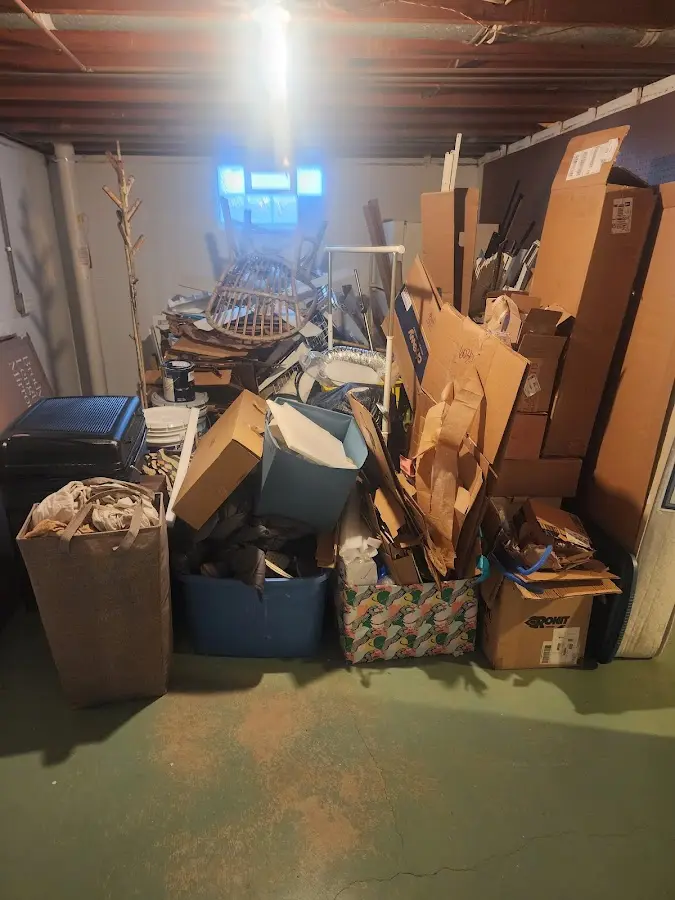 Roll-off dumpster container at job site for 20 Yard Dumpster Rental in Glen Ridge